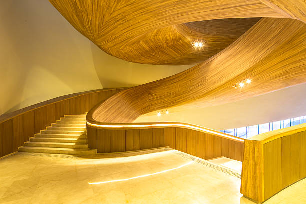 istock wood staircase in modern hotel 545421582