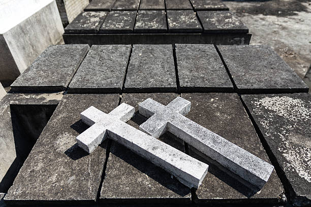 istock Double Concrete Crosses over the Grave 545423832