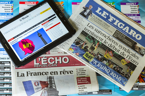 Chartres, France - July 10, 2016: In the morning of the first day of UEFA Euro 2016 major French newspapers publish, both online and in print press, various articles related to the competition which will be held in France between June 10 and July 10, 2016.
