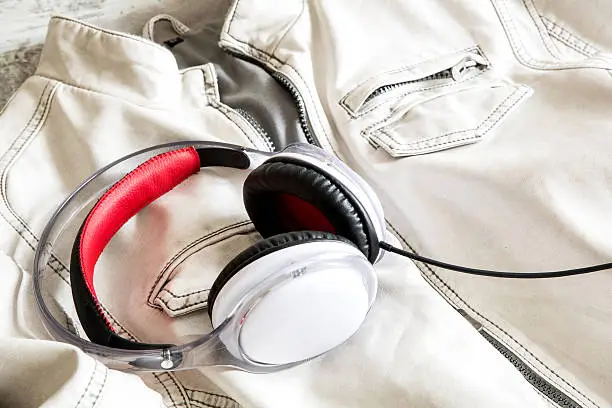 Photo of Headphones on a white Jacket