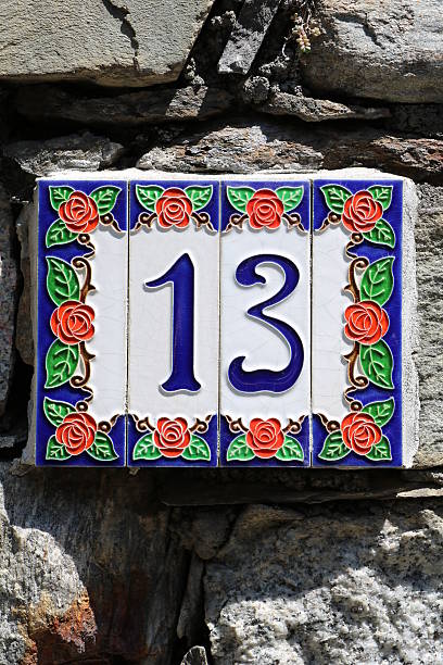 istock Number 13 at house wall 545428626
