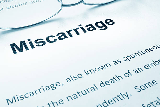 istock Miscarriage sign on a paper and glasses. 545428668