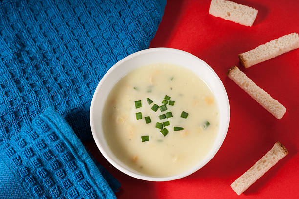 istock Cream soup, towel and bread croutons 545429846