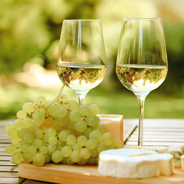 istock Various sorts of cheese and white wine 545430178