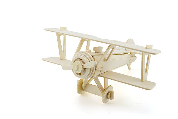 istock Wood airplane isolated on white with clipping path 545430964