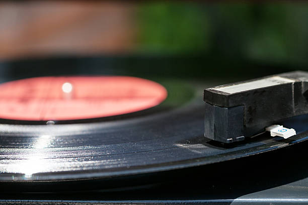 vinyl record in old turntable vinyl record in old turntable close up record player needle stock pictures, royalty-free photos & images