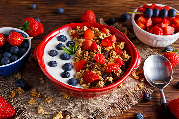 istock Homemade granola Breakfast with yogurt and fresh fruit berries. concepts 545432910