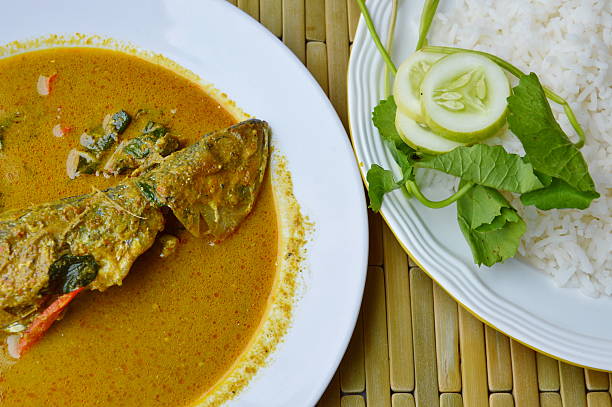 istock mackerel in red curry eat couple with rice and vegetable 545434074