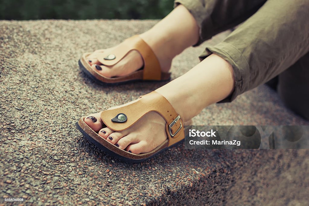 prosperity Emphasis Reductor Womans Feet In Yellow Stylish Summer Sandals Stock Photo - Download Image  Now - Sandal, Women, Leather - iStock