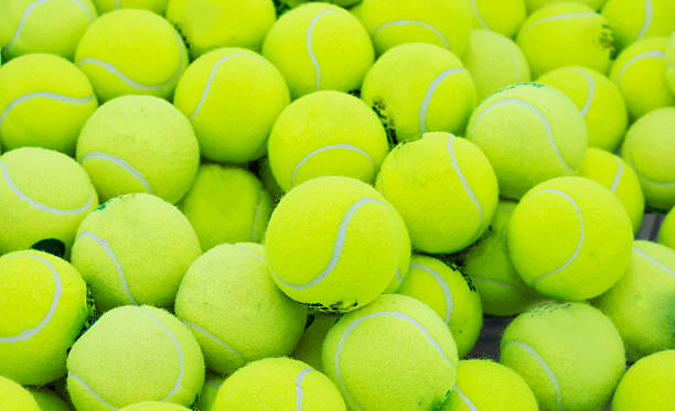 istock tennis balls in the background 545436732