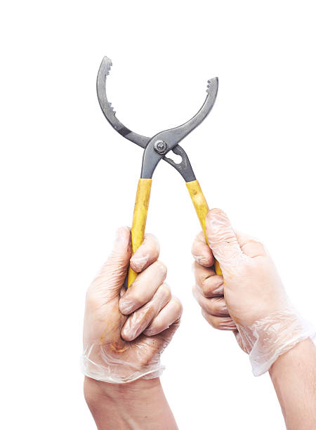istock Worker's caucasian male hand holding tool 545442414