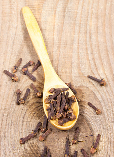 istock Cloves on a wood board. 545443964
