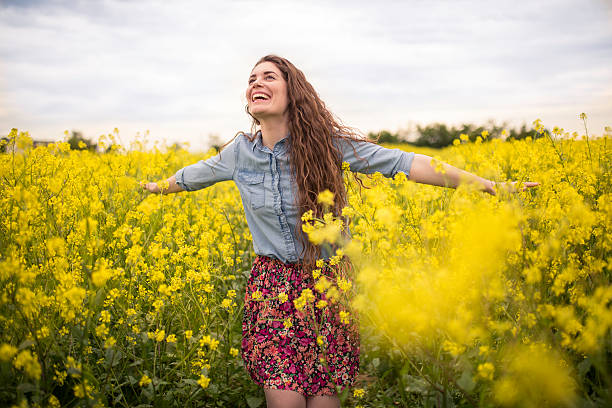 istock Smiling girl in a meadow 545445182