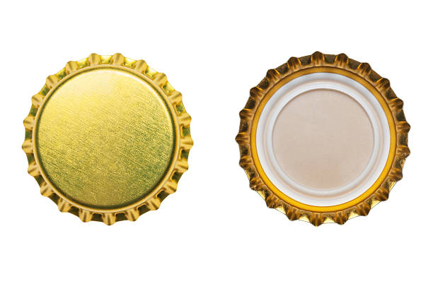 istock yellow bottle caps isolated on white background 545445226