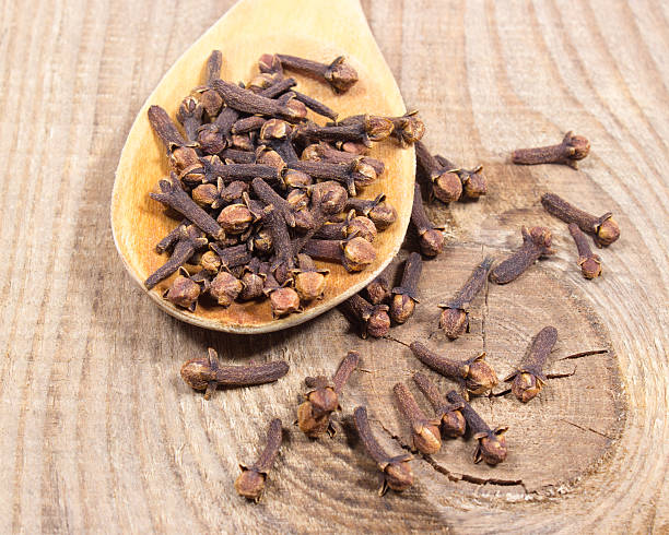 istock Cloves on a wood board. 545445676