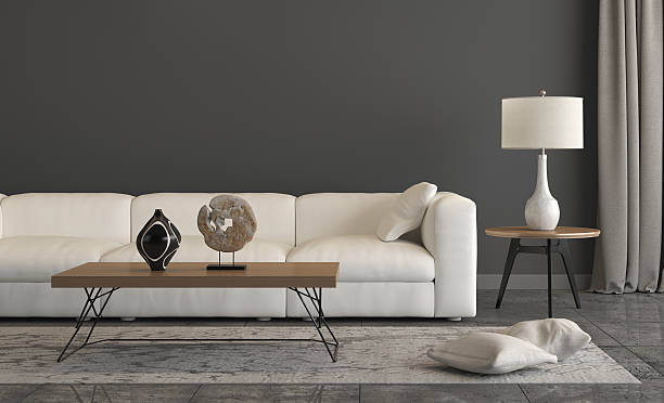 istock White sofa on a dark gray wall in the background 545450324