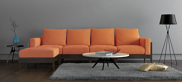 Letter box frame showing contemporary  living room with orange sofa