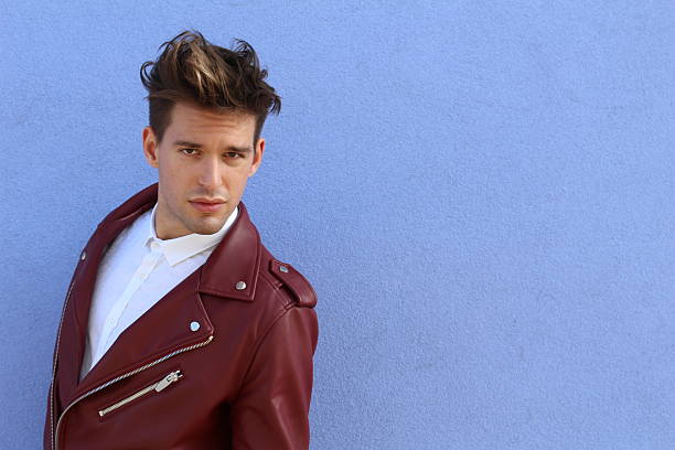 istock Fashion young model man portrait wearing leather 545452068