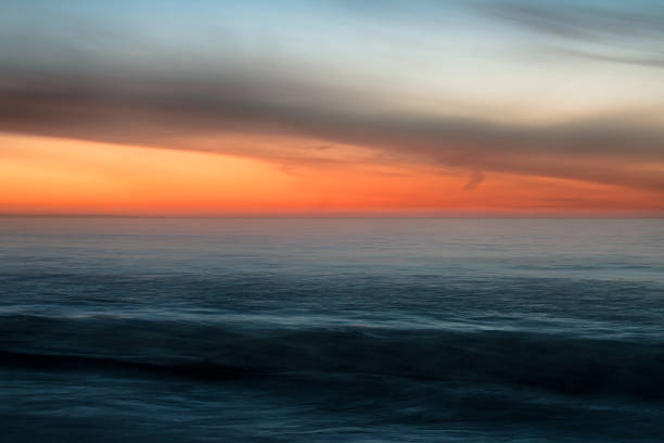 istock Abstract warm toned image of sunset over ocean 545454892