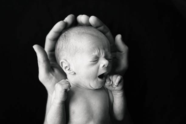 istock Newborn Baby Yawning 545459490