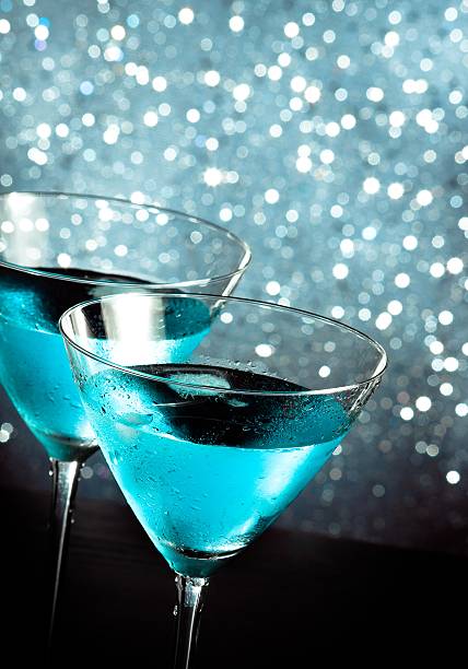 istock glasses of fresh blue cocktail with ice cubes 545462514