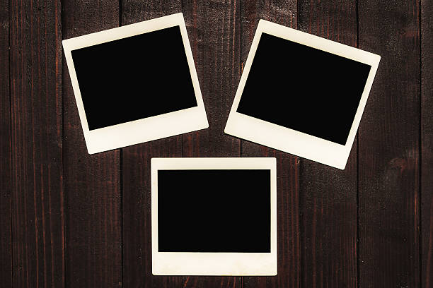 istock Blank Photos on Wooden Background 545463204