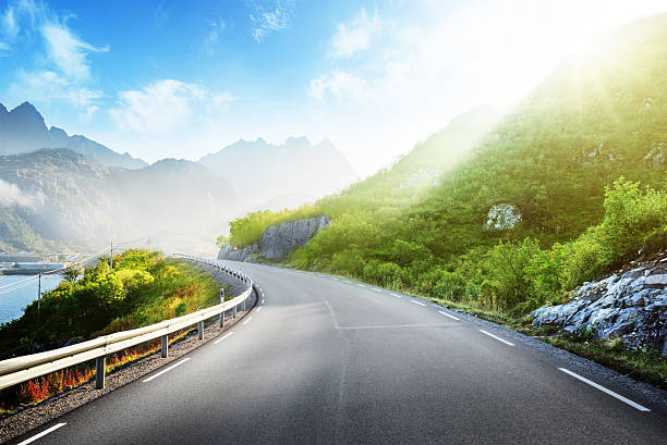 istock road and mist, Lofoten islands, Norway 545463808