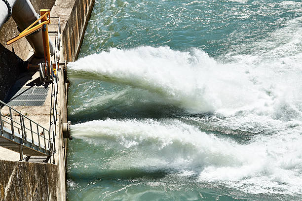 istock Discharge water from dam in the Alps 545466284