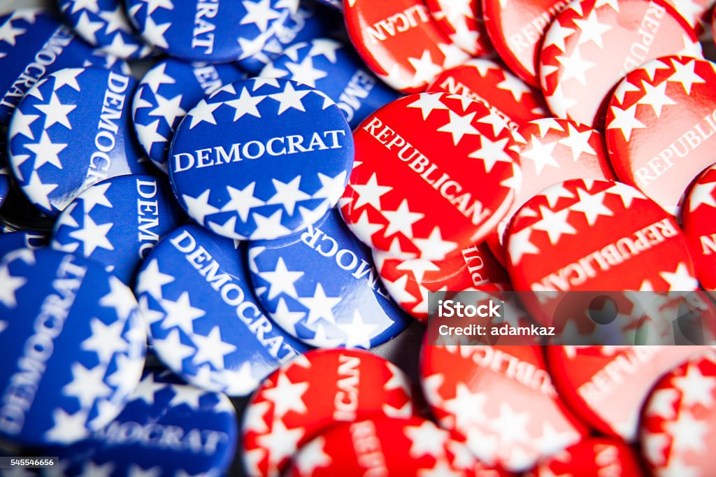 Election Vote Buttons Close up of Vote election buttons, with red, white, blue and stars and stripes. Democrats and Republicans US Republican Party Stock Photo