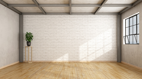 Empty contemporary loft with brick wall,wooden floor and iron beams - 3d rendering