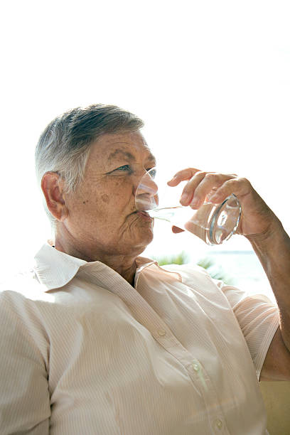 istock Senior Woman Is Drinking Water 545549238