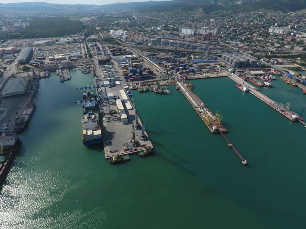 istock Industrial seaport, top view. Port cranes and cargo ships. 545549660