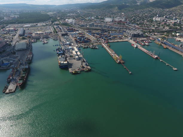 istock Industrial seaport, top view. Port cranes and cargo ships. 545549766