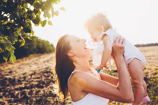 istock mother playing with his little daughter 545550598