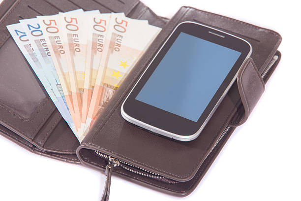 istock euro banknote purse and smartphone 545554252
