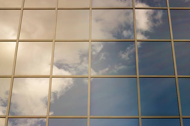 istock sky reflected in the windows of the house 545556894