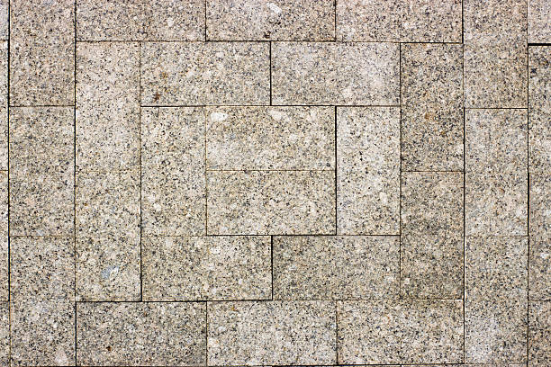istock texture of the granite paving slabs 545558982
