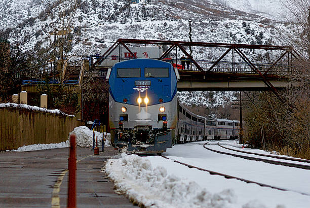 Amtrak's "California Zephyr" Train Arrives in Glenwood Springs, Colorado Glenwood Springs, Colorado, USA - January 7, 2016: Amtrak's "California Zephyr" Eastbound train arrives at the Glenwood Springs Amtrak station following a fresh winter snowfall. Amtrak stock pictures, royalty-free photos & images