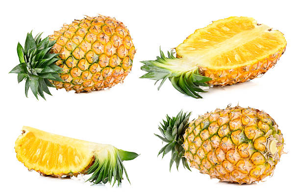 istock Half of pineapple isolated on white 545561516