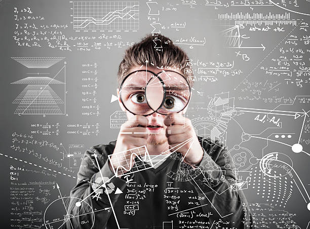 The young man with magnifying glass