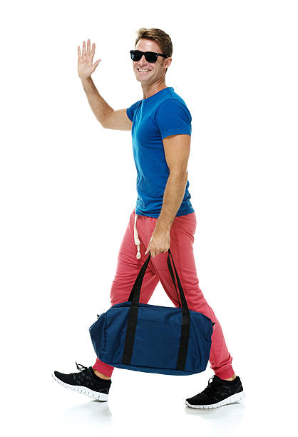 istock Smiling casual man waving hand 545567214