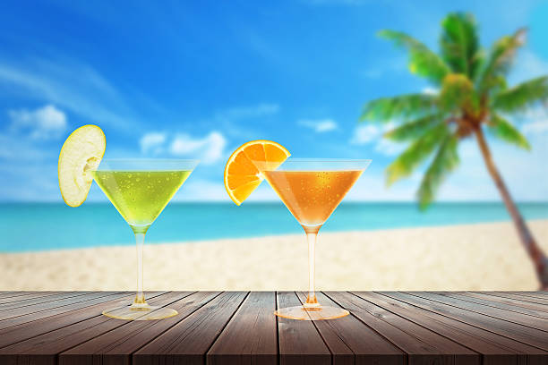istock Cocktail on wooden table. Beach and the sea. 545567322