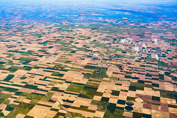 istock Aerial view to patchwork's fields in middle Kansas, USA 545567954