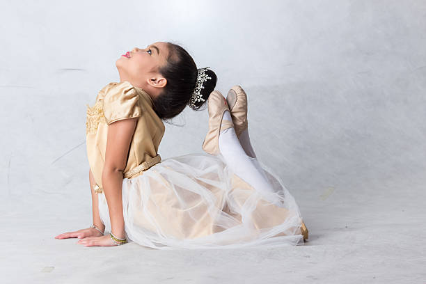 istock beautiful girl ballet in studio 545568294