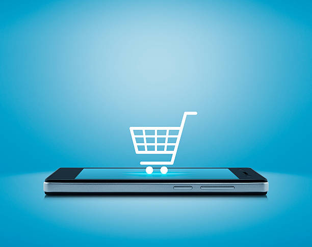 Shopping cart icon on smart phone screen, Shop online concept stock photo
