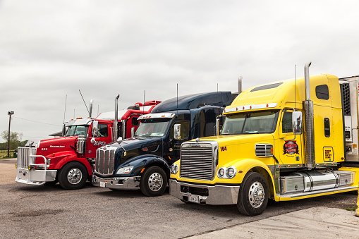 New Orleans, La, USA - April 17, 2016: Freightliner, Peterbilt and Western Star trucks at the parking lot in Louisiana, United States