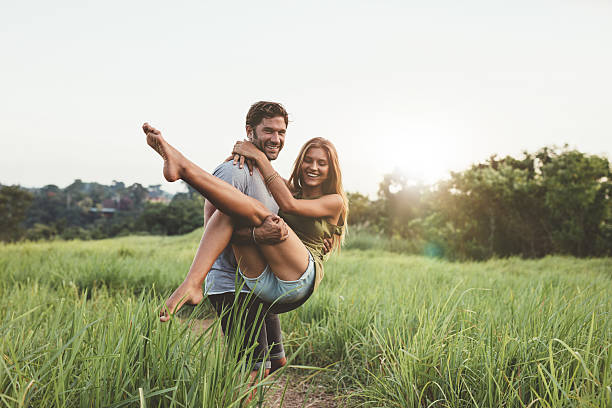 istock Young loving couple having fun outdoor in summertime 545574286