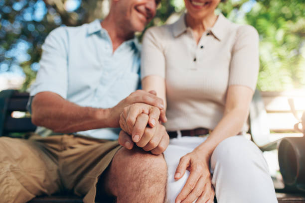 istock Senior couple holding hands 545574612