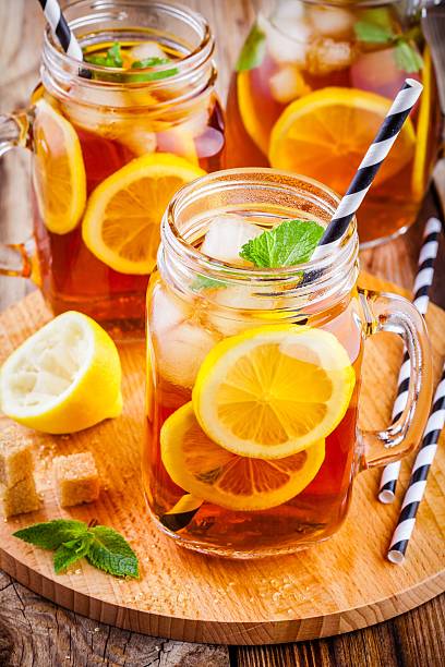 istock ice tea with slice of lemon in mason jar 545575298