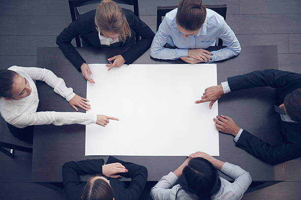 istock Business people and blank paper 545578332